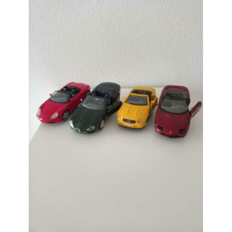 Jaquar xk8__porsche borster___mercedes Benz slk__camaro 228.