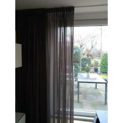 Gordijnen in de kleur taupe