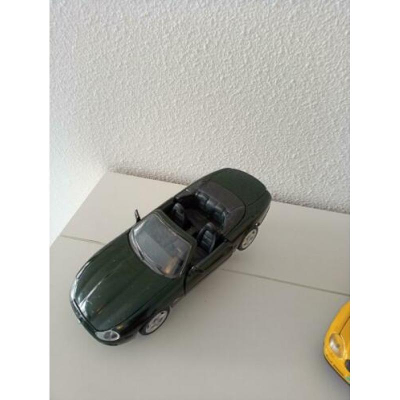 Jaquar xk8__porsche borster___mercedes Benz slk__camaro 228.