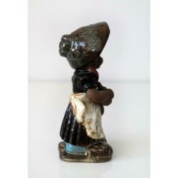 Meisje met pop vintage retro beeldje