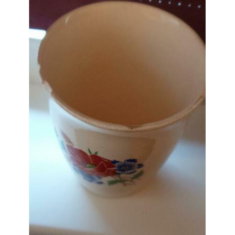 2 oude melkbekers