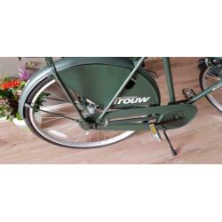 Mannen fiets bijna nieuw met bagedrager .