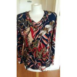 PRACHTIGE BLOUSE; kapot MODA ( S ) NIEUW.