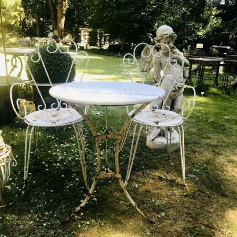 * gietijzer Tuintafel ronde ijzeren tafel natuursteen blad