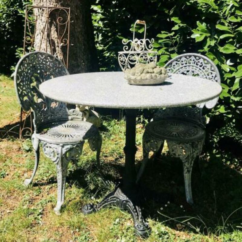 * gietijzer Tuintafel ronde ijzeren tafel natuursteen blad
