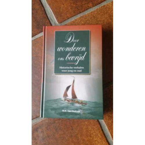 Door wonderen ons bevrijd - W.H. van Oostrum