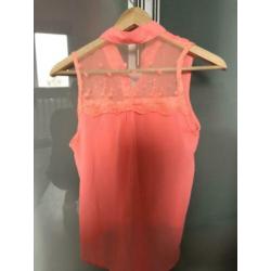 Felle blouse zonder mouw