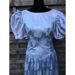 Themafeest blauwe prinsessen jurk met strik/pofmouw 38