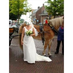 te koop 1 z.g.a.n. witte trouwjurk
