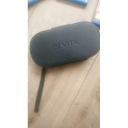 PSP Vita inclusief hoesje, oplader en drie games.