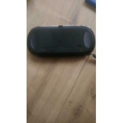 PSP Vita inclusief hoesje, oplader en drie games.