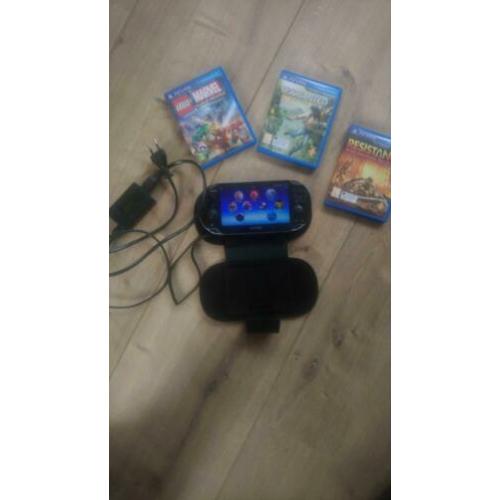 PSP Vita inclusief hoesje, oplader en drie games.