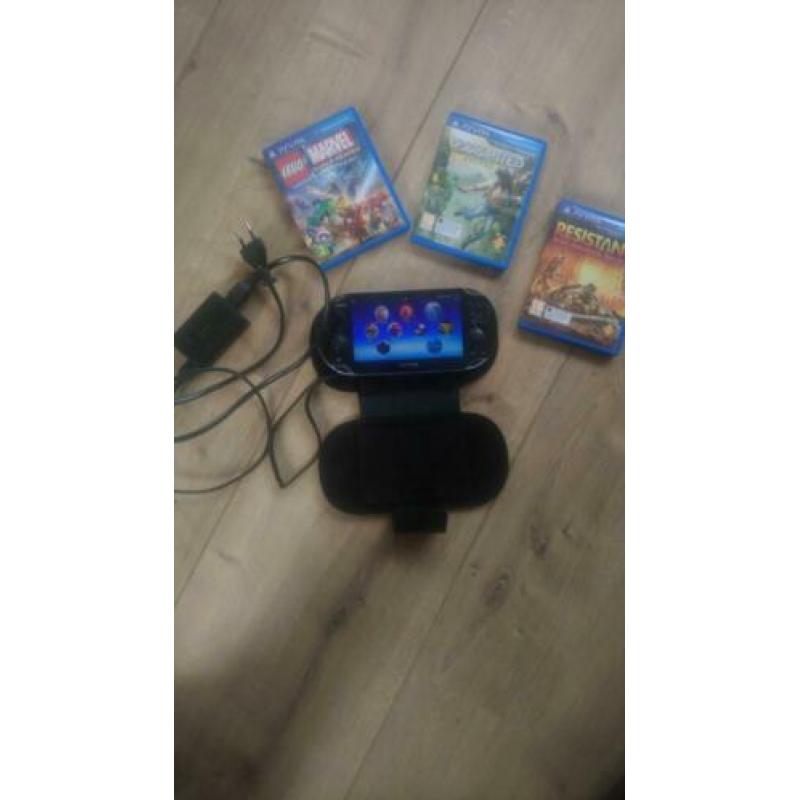 PSP Vita inclusief hoesje, oplader en drie games.