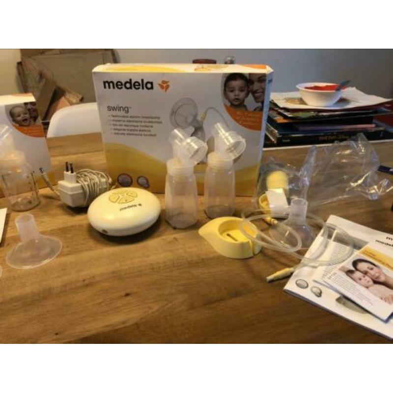 Medela swing + symphony (incl extra Philips avent cups)