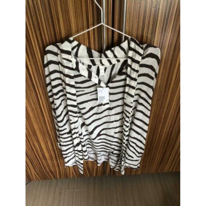 Oversized blouse maat 40