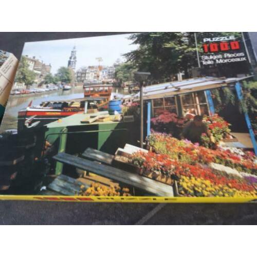 4 puzzels 1000 stukjes en 1 van 500