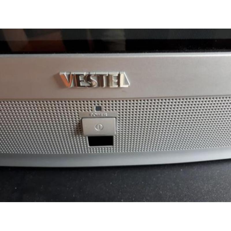 Vestel tv incl afstandbediening en tvkastje..