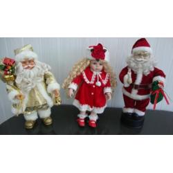 2 mooie kerstmannen en 1 kerstpop samen