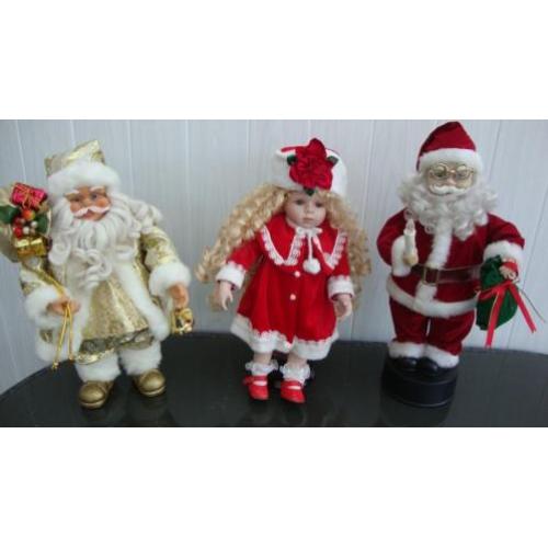 2 mooie kerstmannen en 1 kerstpop samen