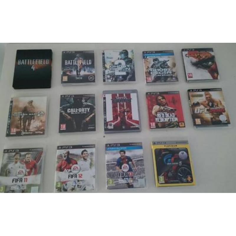 PS3 met 2 controllers, Bluetooth headset en games