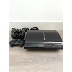 Ps 3 met 3 dual shock controllers en duo oplader 80GB