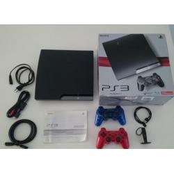 PS3 met 2 controllers, Bluetooth headset en games