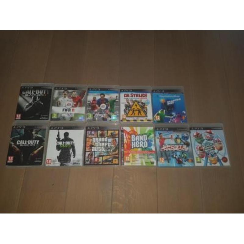 Playstation 3 met 2 controllers en gitaar